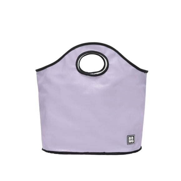 The Brooke Tote by BRNG Bag is a lavender tote with a round handle cutout, black trim, and a small rectangular BRING logo patch near the bottom. Its flat bottom design offers style and roomy functionality for your essentials.